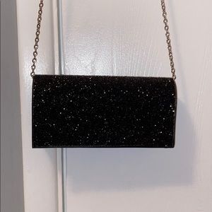 Sparkly black clutch